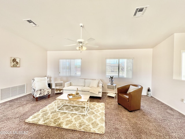 living area with visible vents and carpet flooring