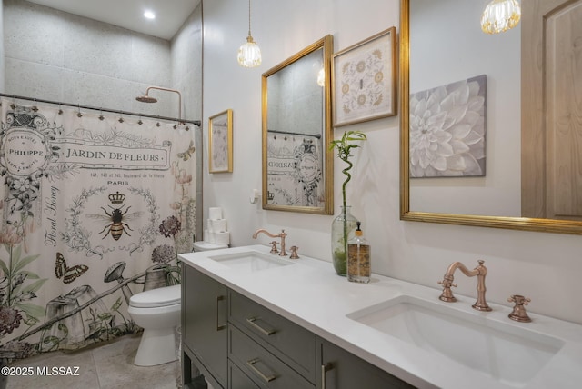 full bath featuring double vanity, a shower with shower curtain, a sink, and toilet