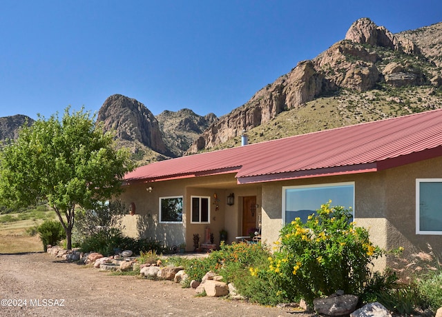 view of front of house with a mountain view