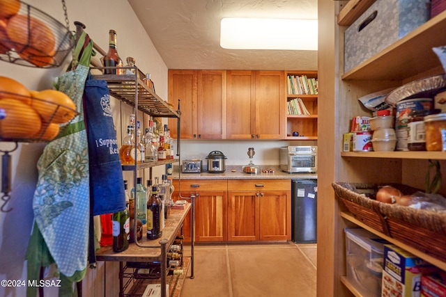 kitchen with a textured ceiling