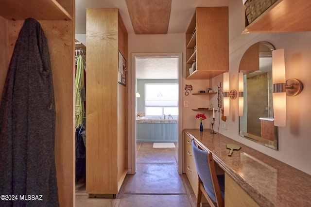 bathroom featuring concrete floors