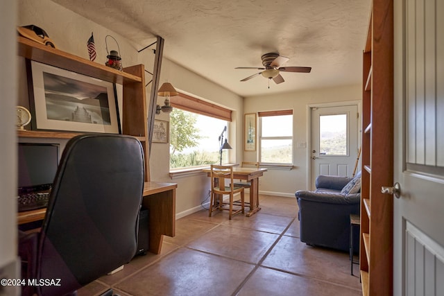 office with baseboards and a ceiling fan
