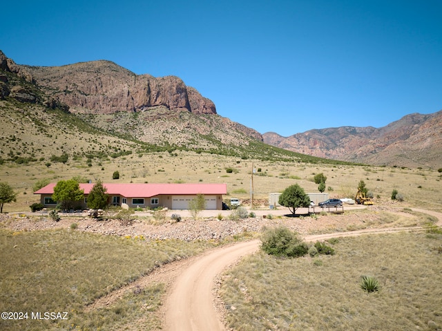 view of mountain feature with a rural view