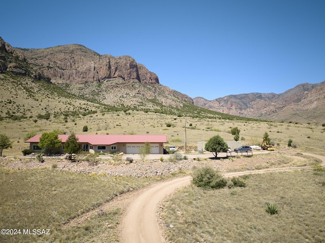 view of mountain feature with a rural view