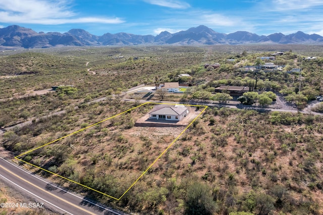 drone / aerial view featuring a mountain view