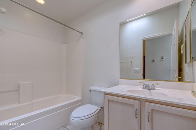 full bathroom with tile floors,  shower combination, vanity with extensive cabinet space, and toilet