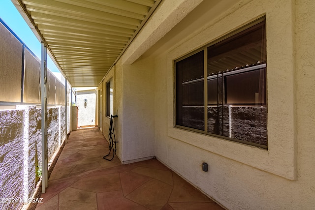 corridor featuring tile floors