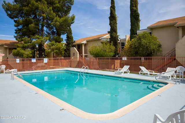 view of pool featuring a patio