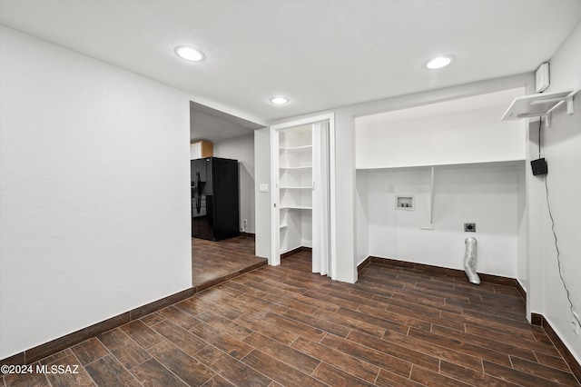 interior space with dark hardwood / wood-style flooring