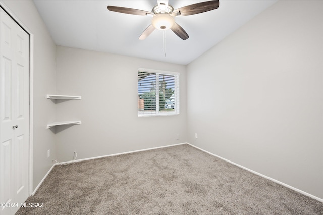 interior space featuring a closet, ceiling fan, and carpet flooring