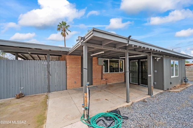 view of terrace featuring a carport