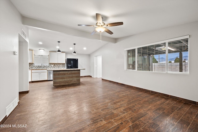 unfurnished living room featuring ceiling fan, dark hardwood / wood-style flooring, and lofted ceiling