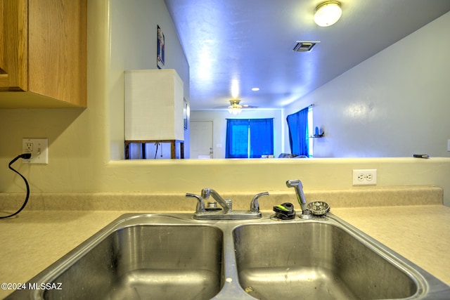 kitchen with sink and ceiling fan