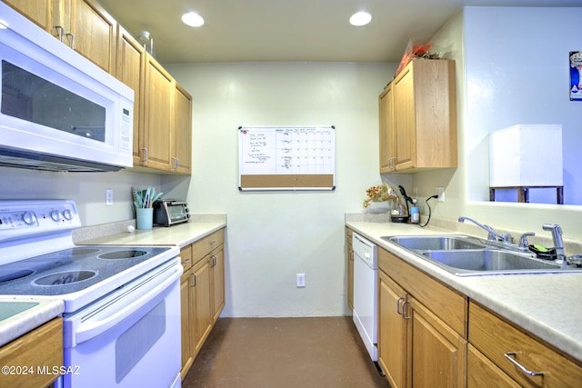 kitchen with white appliances and sink