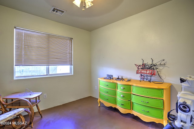 bedroom with concrete flooring