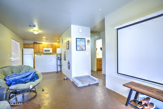 interior space featuring concrete flooring