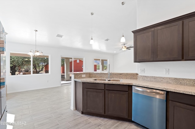 kitchen with dishwasher, decorative light fixtures, ceiling fan with notable chandelier, and light hardwood / wood-style flooring