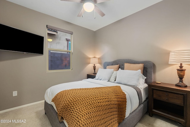 bedroom with ceiling fan and carpet