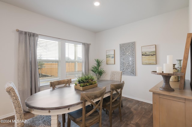 dining area featuring dark hardwood / wood-style flooring