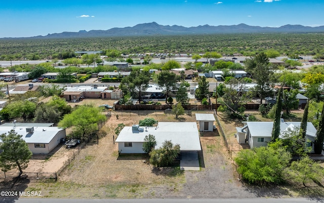 birds eye view of property featuring a mountain view