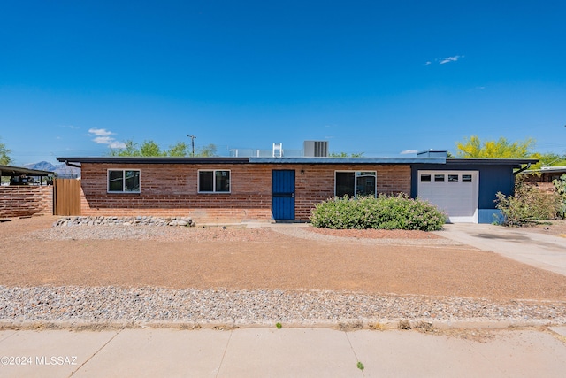 ranch-style house with a garage