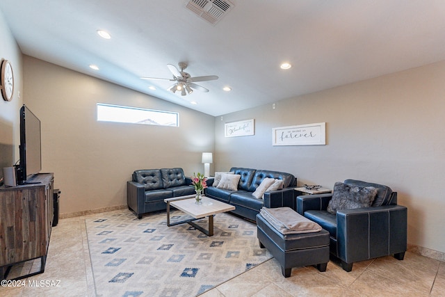 tiled living room with lofted ceiling and ceiling fan