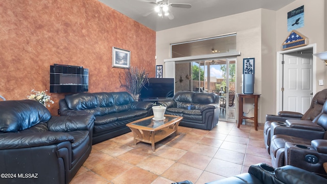 living room with ceiling fan and light tile flooring