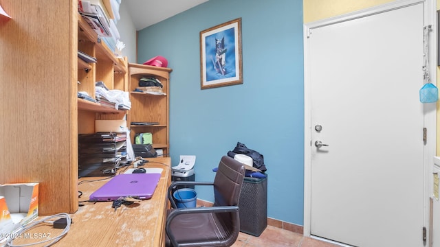 office area featuring light tile flooring