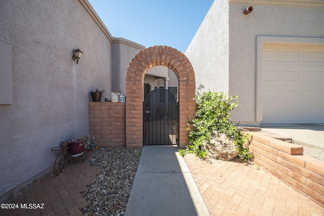 property entrance featuring a garage