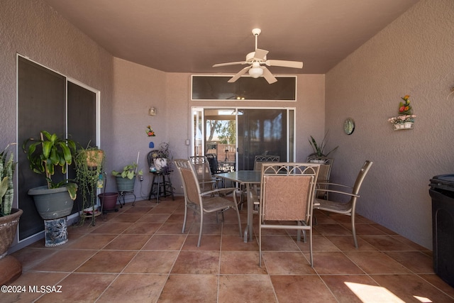 view of patio featuring ceiling fan