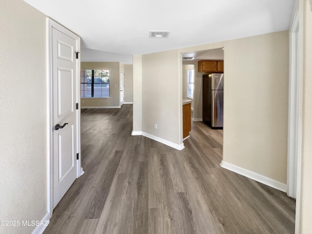 hallway featuring dark hardwood / wood-style floors