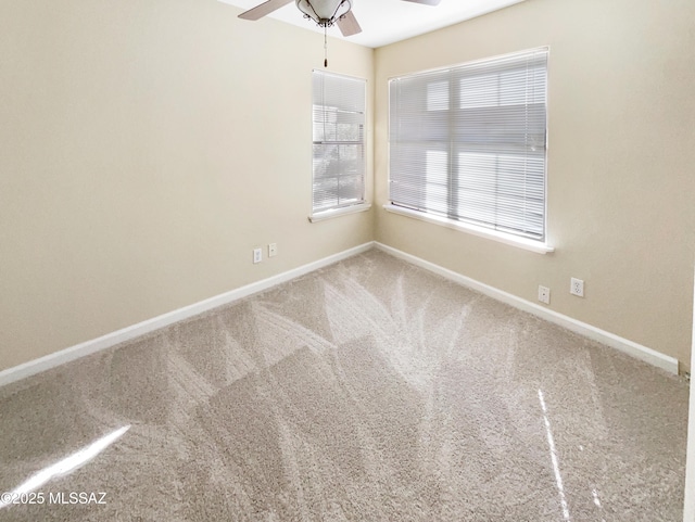 unfurnished room featuring carpet flooring and ceiling fan