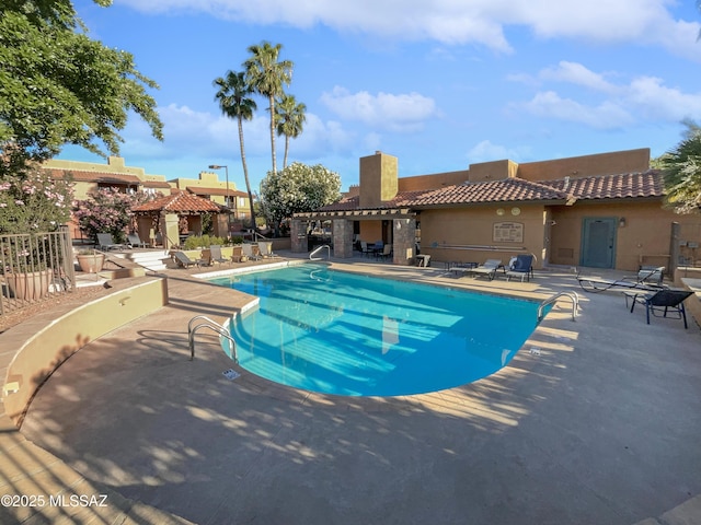 view of swimming pool featuring a gazebo and a patio area