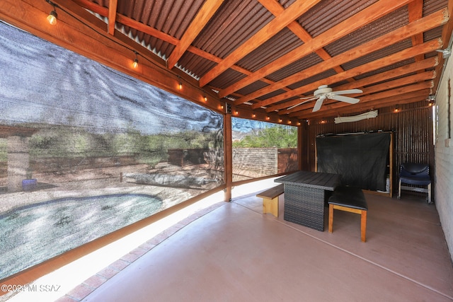 view of patio featuring ceiling fan