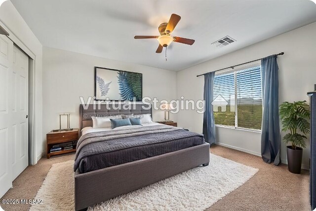 carpeted bedroom featuring ceiling fan