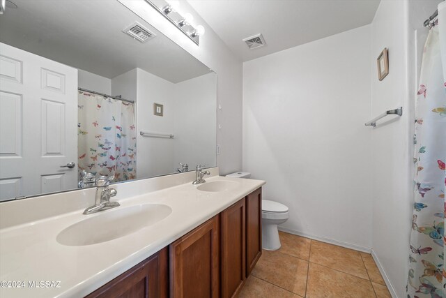 carpeted bedroom featuring a closet and ceiling fan