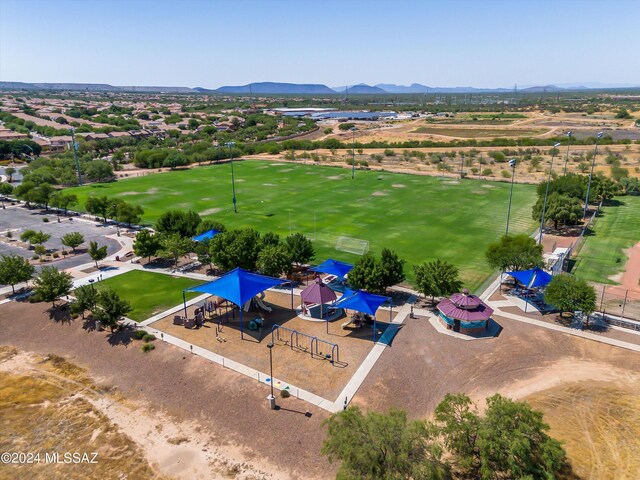 birds eye view of property featuring a mountain view