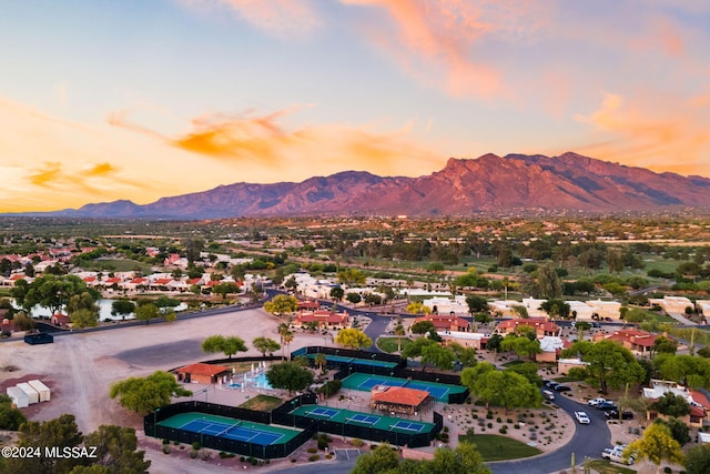 aerial view at dusk with a mountain view