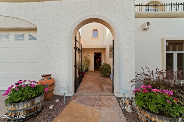 property entrance with a garage