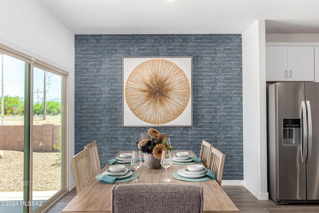 dining space featuring hardwood / wood-style floors