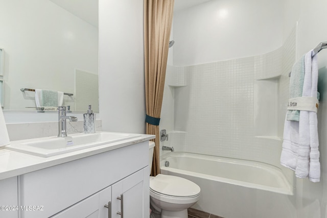 full bathroom with toilet, vanity, and shower / bath combination with curtain