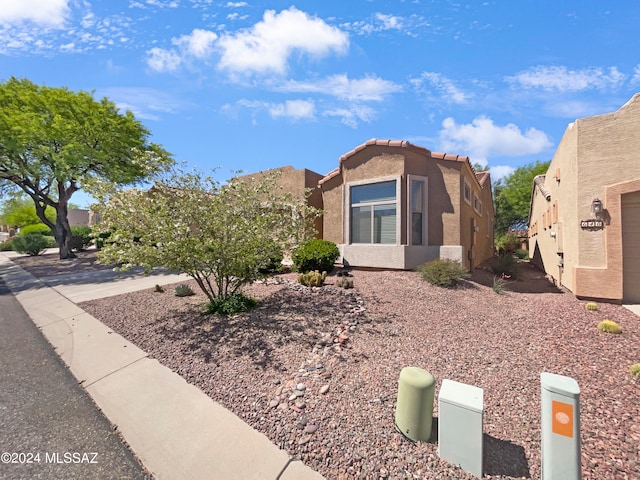 view of front of home with a garage