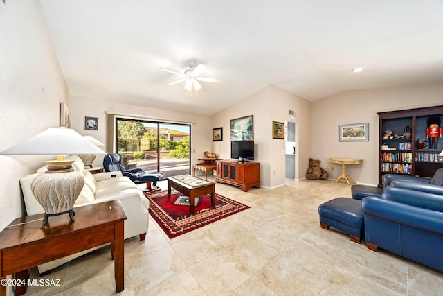 living room featuring ceiling fan and vaulted ceiling