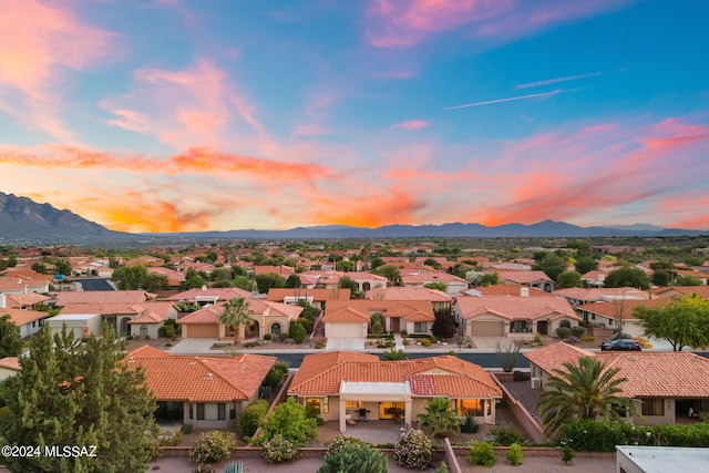 aerial view at dusk with a mountain view