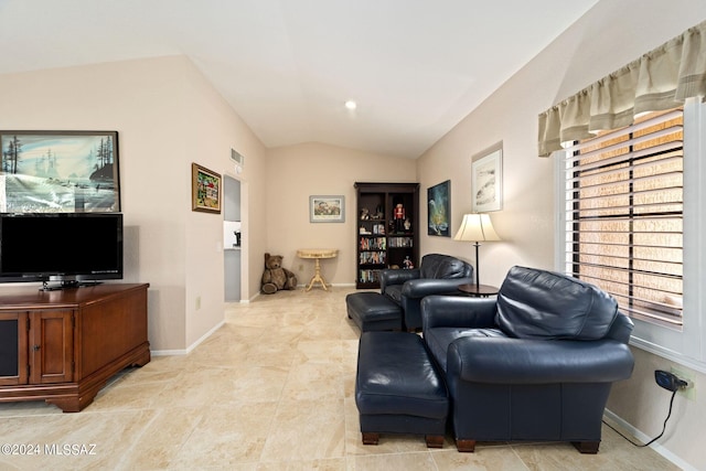 living room with lofted ceiling