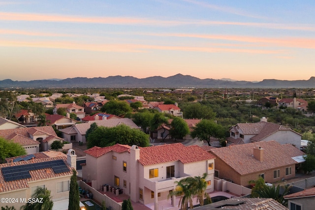 aerial view at dusk with a mountain view