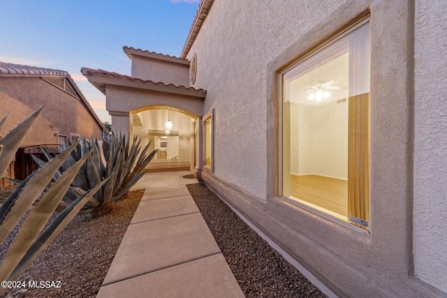 view of property exterior at dusk