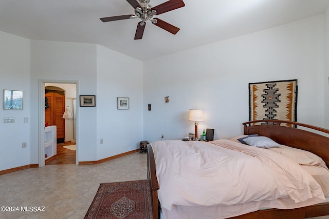 tiled bedroom with ceiling fan