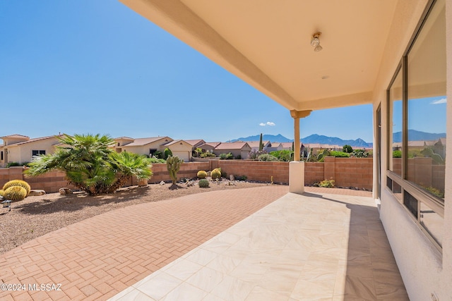 view of terrace featuring a mountain view