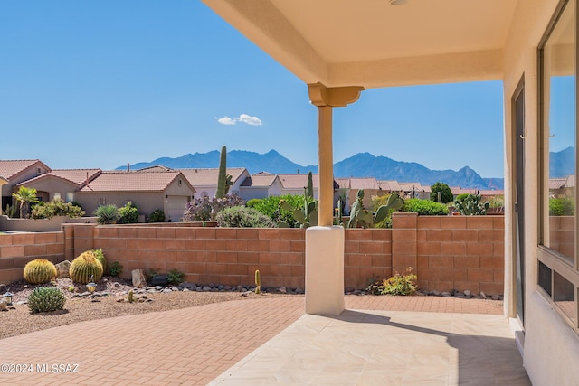 view of patio with a mountain view